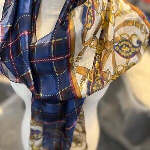 Italian made :equestrian style scarf. Very pretty: blues and golds 62” Lx14” w
